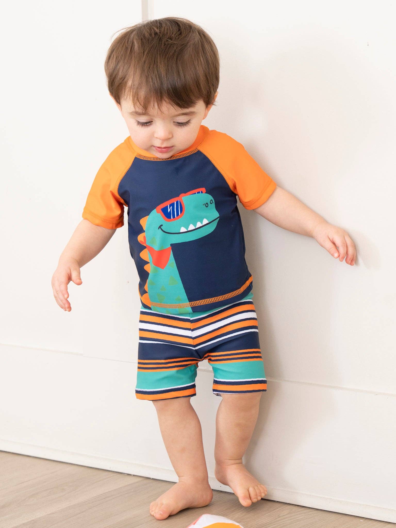 Navy Striped Dino Rash Guard & Swim Shorts